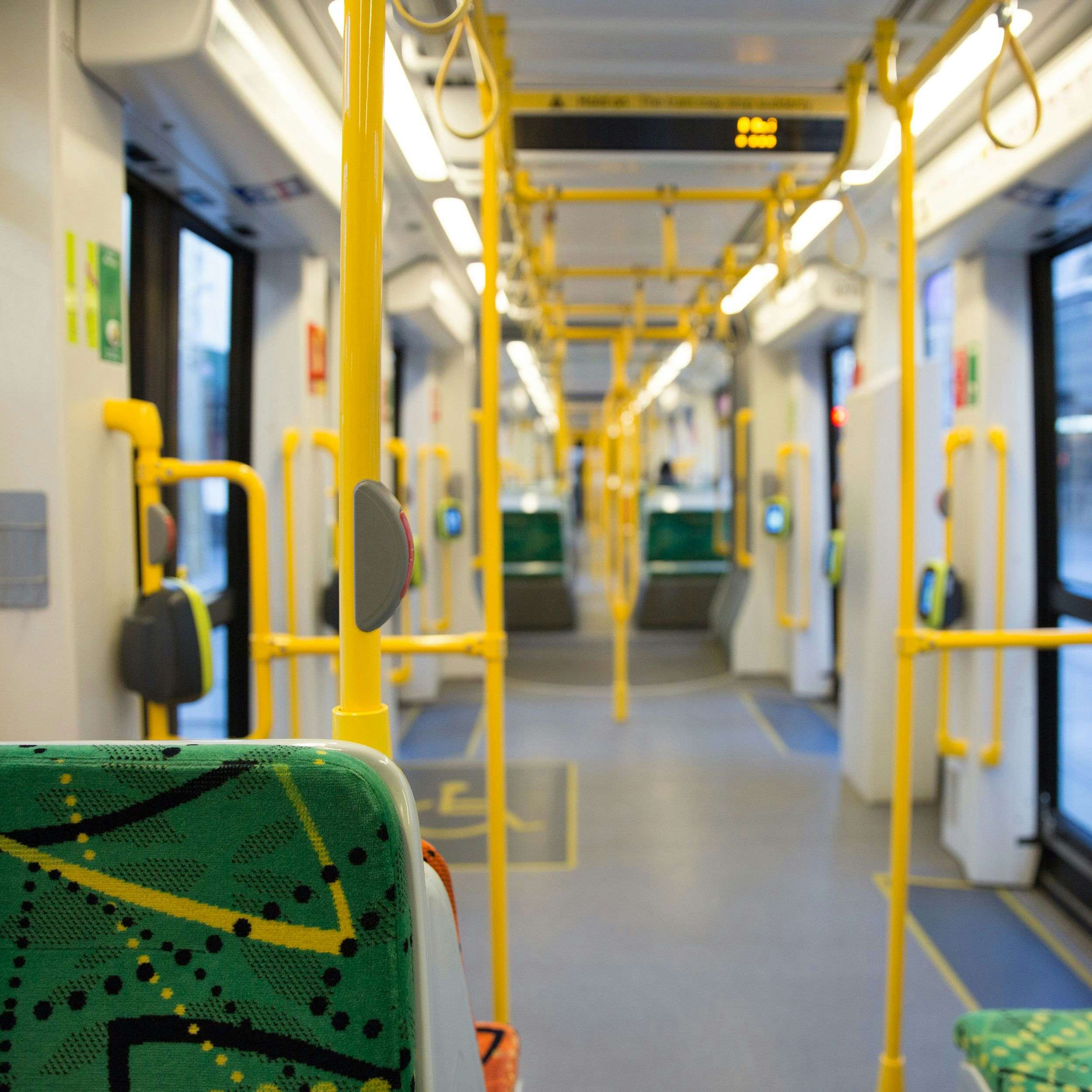 The interior of an empty tram in Melbourne, Victoria.